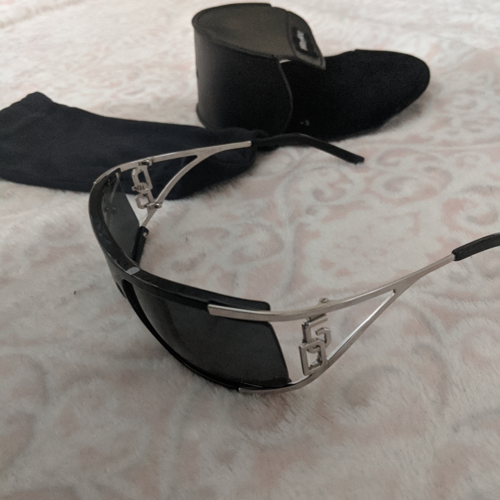 Dolce and Gabana sunglasses with case.